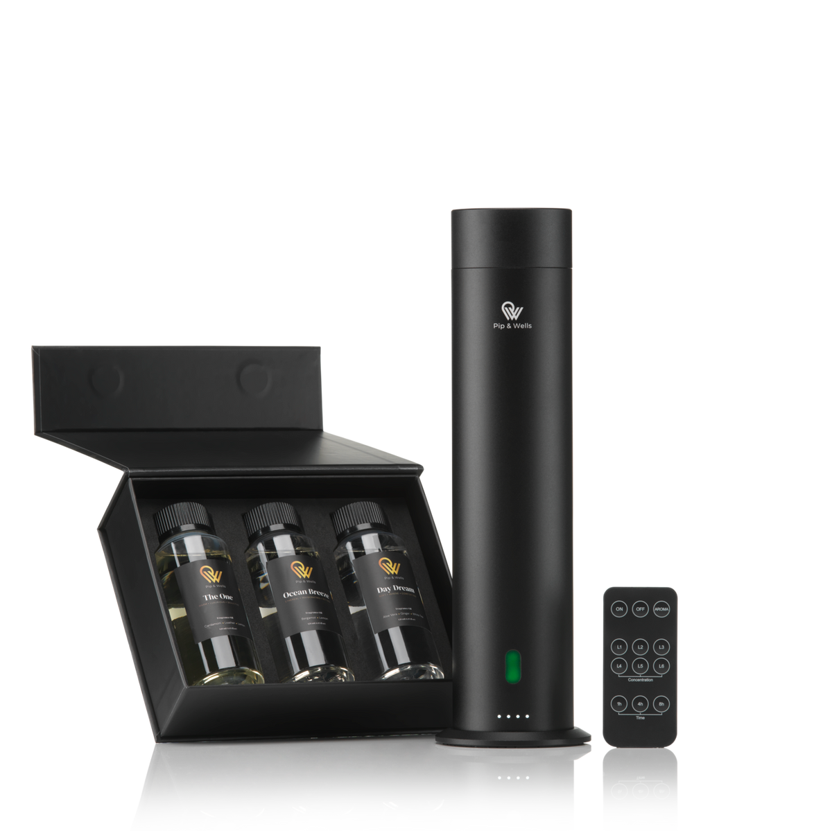 Pip & Wells Pure One aroma diffuser gift set in matte black with three fragrance oils, a considered corporate home fragrance gift